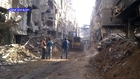 Syria: Yarmouk camp - trucks are opening the streets as an intro to open all ports of the camp