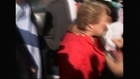 Man spits in the face of former Chilean president and current presidential contender, Michelle Bachelet.