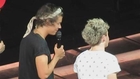 One Direction answer fans twitter questions at concert